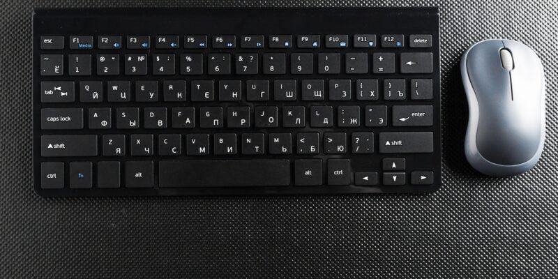 keyboard and mouse on the table .