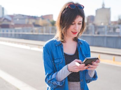 portrait of young woman using smartphone