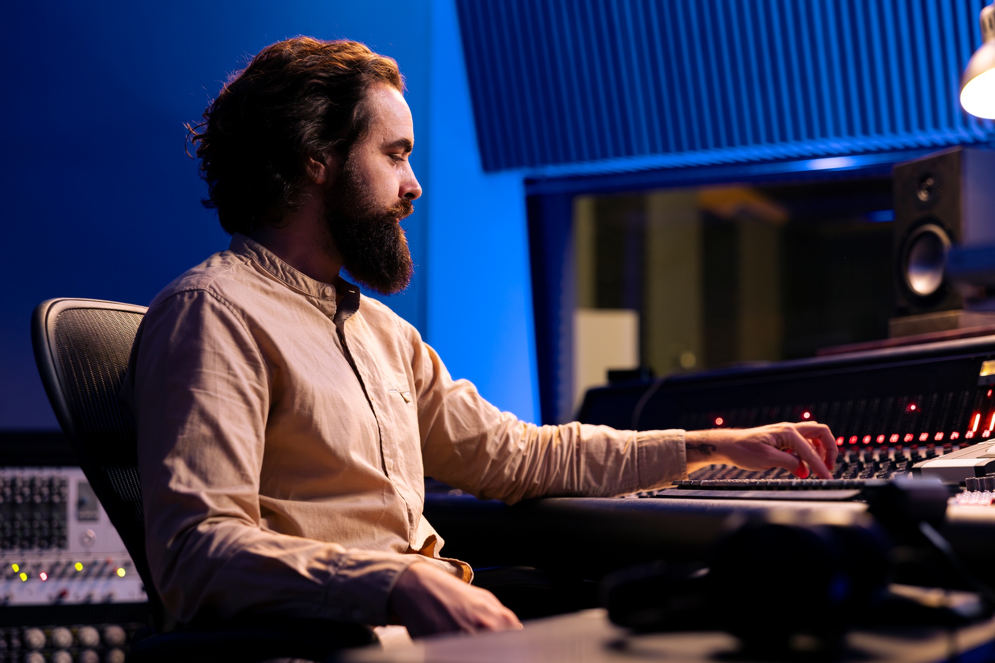 Sound expert working on recording and composing new tracks
