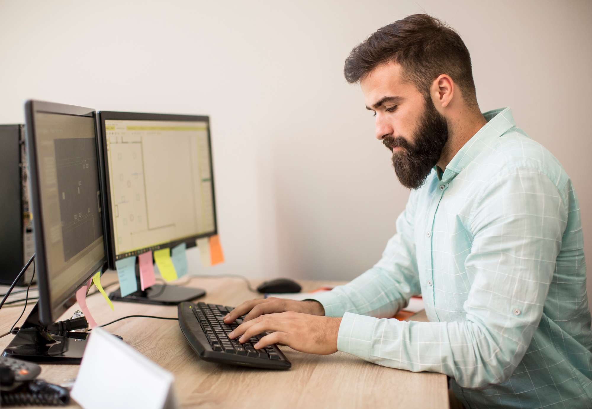 Young man working on pc computer